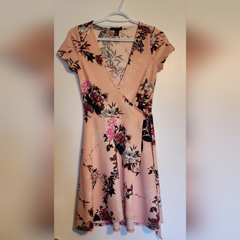 Revamped Blush Pink Floral Wrap-Style Mini Dress